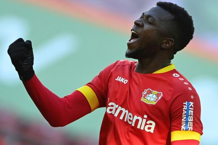 Leverkusen defender Edmond Tapsoba celebrates after scoring their last-gasp equaliser at Augsburg on Sunday