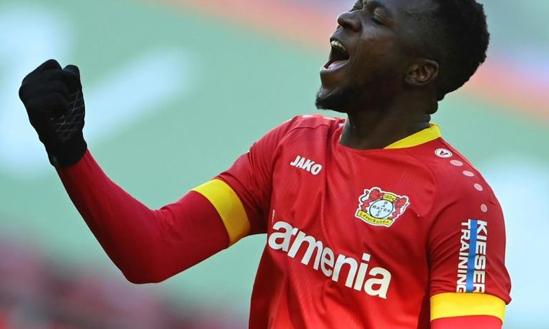 Leverkusen defender Edmond Tapsoba celebrates after scoring their last-gasp equaliser at Augsburg on Sunday