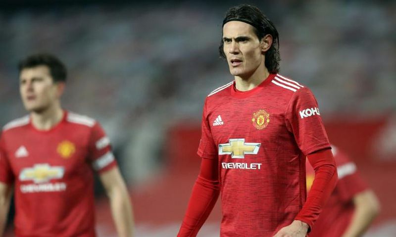 Edinson Cavani (right)has been controversially banned by the English FA over a social media post