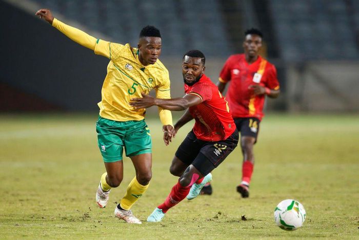 South African Sibusiso Mabiliso (L) and Ugandan Abdu Lumala seek possession during a friendly international in Soweto on Thursday.