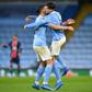 Manchester City's John Stones and Ruben Dias celebrate