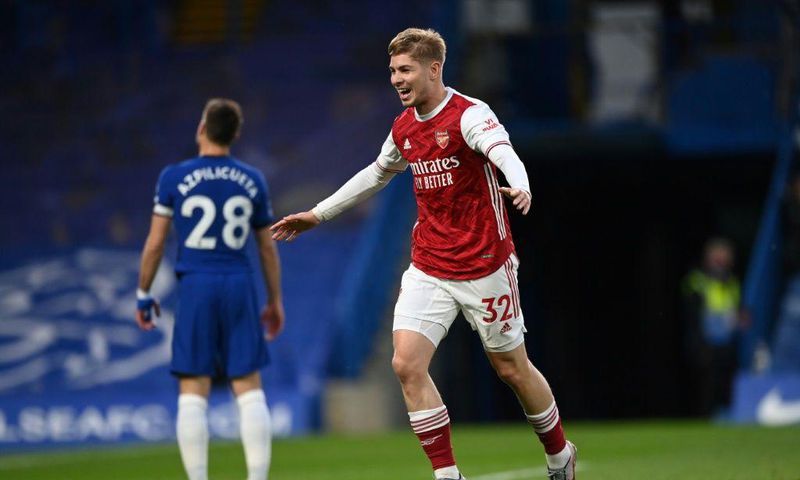 Arsenal midfielder Emile Smith Rowe celebrates scoring at Chelsea