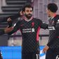 Liverpool forward Mohamed Salah (C) celebrates scoring  against West Ham