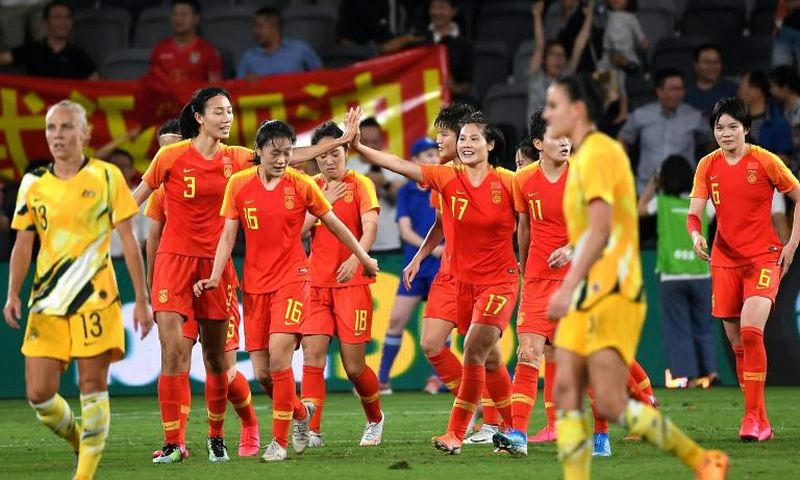 China's players celebrate scoring against Australia during the women's Olympic football tournament in Sydney in February last year. Now more than a year later they have the chance to complete their quest for an Olympic place when they face South Korea