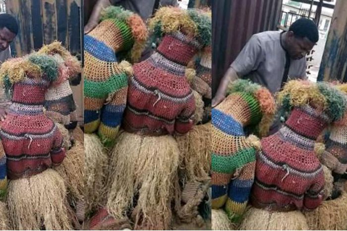 Masquerades kneel as pastor prays for them in public
