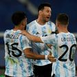 Argentina's Lionel Messi (center) celebrates his goal against Chile at the 2021 Copa America with teammates Nicolas Gonzalez (left) and Giovani Lo Celso