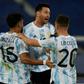 Argentina's Lionel Messi (center) celebrates his goal against Chile at the 2021 Copa America with teammates Nicolas Gonzalez (left) and Giovani Lo Celso