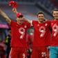 (L-R) Bayern Munich stars Robert Lewandowski, Thomas Mueller and Manuel Neuer celebrate their ninth league title in a row