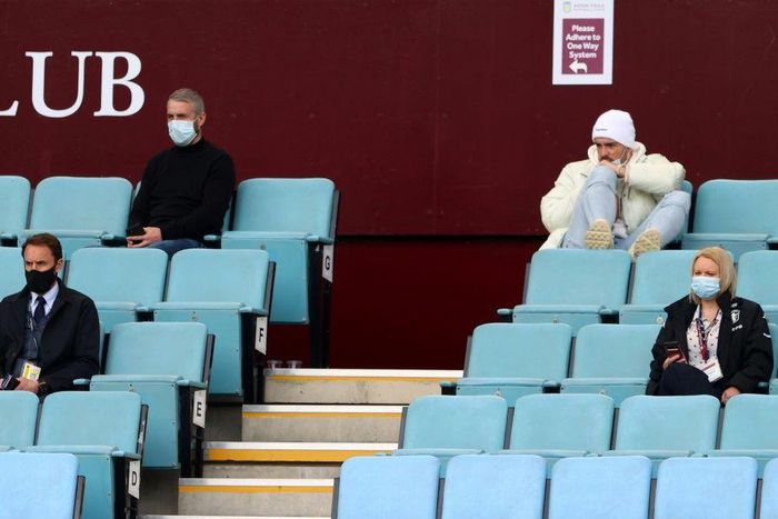 Watching brief - Aston Villa's injured midfielder Jack Grealish (top R) follows the game from the Villa Park stands along with England manager Gareth Southgate (L)