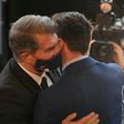 Laporta (L) is hopeful of keeping Messi (R) at Barcelona