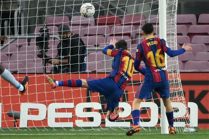 Lionel Messi scores his 643rd goal for Barcelona to equal Pele's single-club record