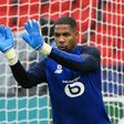 Lille's French goalkeeper Mike Maignan warms up prior to the  French Cup round of 16 football match between Paris Saint-Germain (PSG) and Lille (LOSC) at the Parc des Princes stadium in Paris, on March 17, 2021.