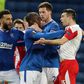 Rangers midfielder Glen Kamara (C) and Slavia Prague defender Ondrej Kudela (R) clash at Ibrox