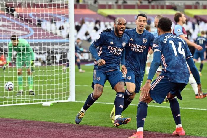 Three and easy: Alexandre Lacazette (2nd left) scored the equaliser as Arsenal came from 3-0 down to draw 3-3 at West Ham