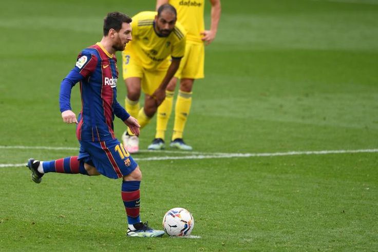 Lionel Messi scored a penalty for Barcelona against Cadiz on Sunday,.