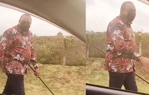 Kenyan’s Prez Uhuru Kenyatta walks alone in town as man threatens to shoot him