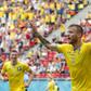 Andriy Yarmolenko celebrates scoring the opening goal for Ukraine against North Macedonia