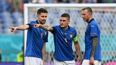 (L to R): Italy's Jorginho, Marco Verratti and Federico Bernardeschi plot victory against Wales