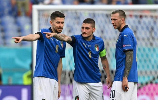 (L to R): Italy's Jorginho, Marco Verratti and Federico Bernardeschi plot victory against Wales