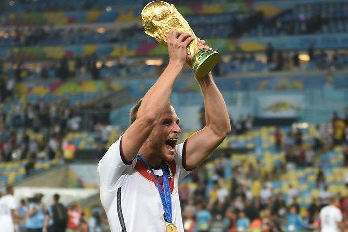 Germany defender Benedikt Hoewedes celebrates winning the 2014 World Cup in Brazil