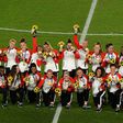 Canada pose with their Olympic gold medals after beating Sweden on penalties