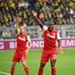 Cologne's French forward Anthony Modeste (C) scored twice against Wolfsburg on Tuesday
