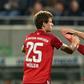 Thomas Mueller (L) celebrates after scoring Bayern Munich's opening goal at Fuerth on Friday