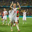Switzerland's Granit Xhaka leads the celebrations after their victory over the world champions
