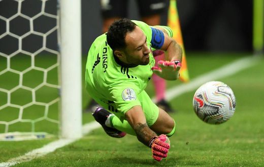 Colombia goalkeeper David Ospina saves a shoot-out penalty from Uruguay's Jose Gimenez during the 2021 Copa America quarter-final