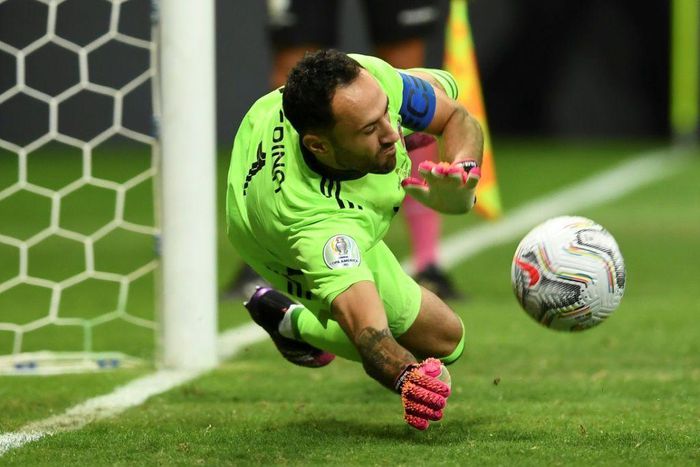 Colombia goalkeeper David Ospina saves a shoot-out penalty from Uruguay's Jose Gimenez during the 2021 Copa America quarter-final