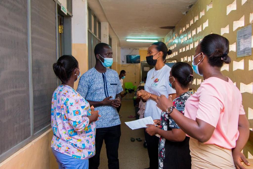 Stephanie Karikari celebrates with mothers at Winneba Municipal Hospital