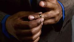 Man pullling off wedding ring [Credit: Le Club/Symphonie Getty Images]