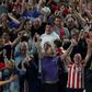 Bouncing Bees: Christian Norgaard (left) celebrates Brentford's second goal in a 2-0 win over Arsenal to open the Premier League season