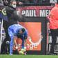 Marseille's French midfielder Dimitri Payet (left) was hit by a bottle of water thrown from the stands during the Ligue 1 match against Lyon