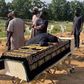 Farida was inconsolable as her husband was laid to rest. NaijaFM]