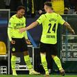 Dortmund's Dutch forward Donyell Malen (L) celebrates his first goal for the club