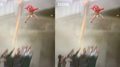 Heart-stopping moment a baby is thrown from burning story building in South Africa