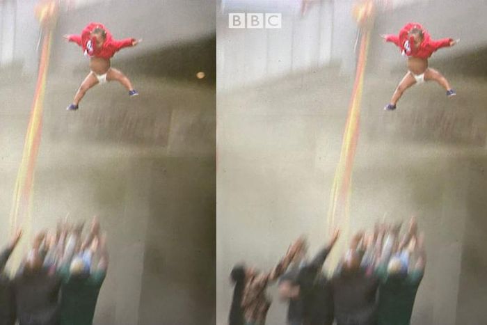 Heart-stopping moment a baby is thrown from burning story building in South Africa