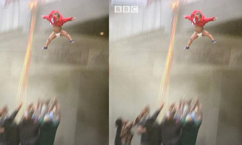 Heart-stopping moment a baby is thrown from burning story building in South Africa