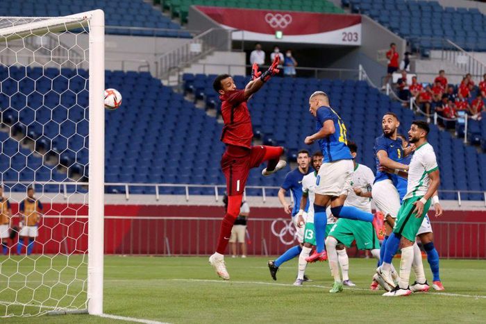 Richarlison heads in the first of his two goals as Brazil beat Saudi Arabia at the Olympics