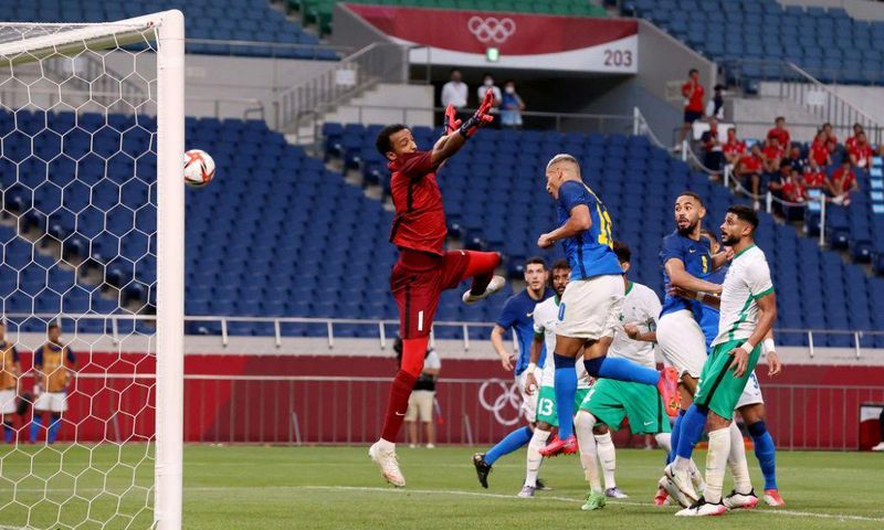 Richarlison heads in the first of his two goals as Brazil beat Saudi Arabia at the Olympics