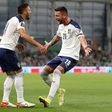 Serbia midfielder Sergej Milinkovic-Savic (R) celebrates scoring against the Republic of Ireland