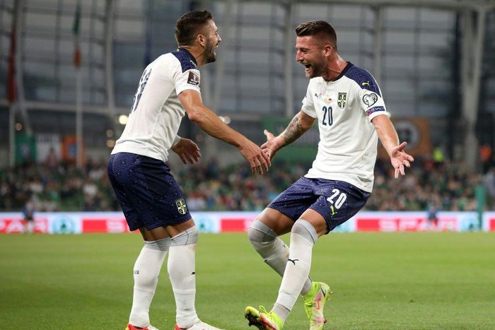 Serbia midfielder Sergej Milinkovic-Savic (R) celebrates scoring against the Republic of Ireland