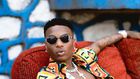 Wizkid loves his floral beach shirts {instagram/wizkid}