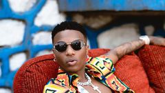 Wizkid loves his floral beach shirts {instagram/wizkid}