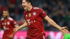 Bayern Munich striker Robert Lewandowski celebrates his hat-trick in the 5-0 thrashing of Hertha Berlin