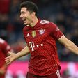 Bayern Munich striker Robert Lewandowski celebrates his hat-trick in the 5-0 thrashing of Hertha Berlin
