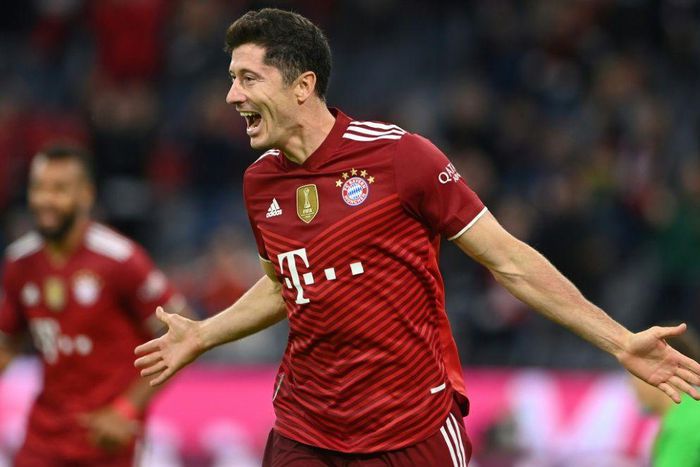 Bayern Munich striker Robert Lewandowski celebrates his hat-trick in the 5-0 thrashing of Hertha Berlin