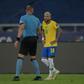 Argentine referee Nestor Pitana, left, speaks with Brazil's Neymar during the Copa America football tournament group phase match between Brazil and Colombia on Wednesday in Rio de Janeiro