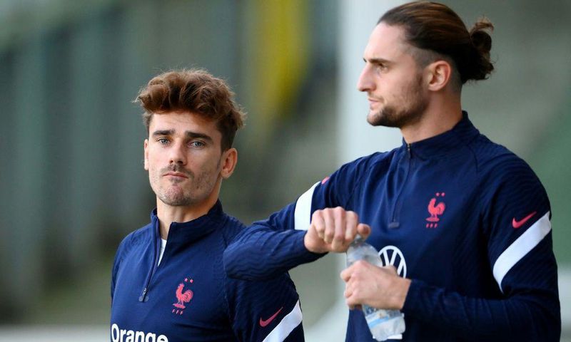 Antoine Griezmann (L) is set to make his 100th France appearance while Adrien Rabiot is out of the Nations League final following a positive Covid-19 test